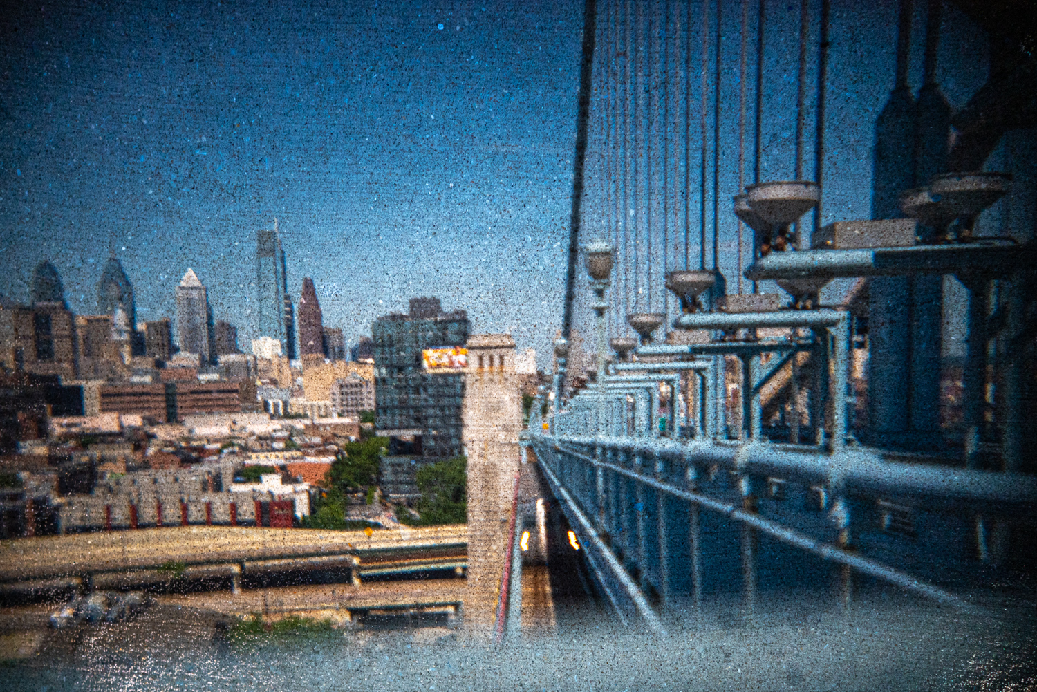 Camera Obscura photograph of Ben Franklin Bridge and the concrete Pedestrian Path with train on tracks