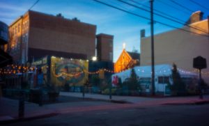Using the long shutter speed of a pinhole lens in the Italian Market in Philly
